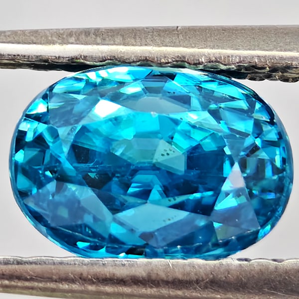 Natural Blue Zircon Gemstones 2.26 Ct. Oval Shape 7.3 x 5.3 Mm.: Product ID: 807743023 Product Name: Natural Zircon Weight: 2.26 CT. Size: 7.3 x 5.3 x 5.5 MM. Shape: Oval Color: Blue Clarity:VSI - SI1 Luster: Good Gems Origin: Cambodia Treatment: Heated Crystal Str