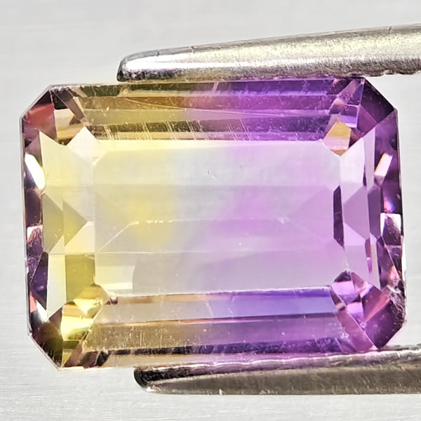 Natural Bi Color Ametrine Gemstones 2.26 Ct. Octagon Shape 9.1 x 6.9 Mm.: Product ID: 800408302 Product Name: Natural Ametrine Weight: 2.26 CT. Size: 9.1 x 6.9 x 4.6 MM. Shape: Octagon Color: Bi Color Clarity:VSI Luster: Good Gems Origin: Bolivia Treatment: Unheated Crystal