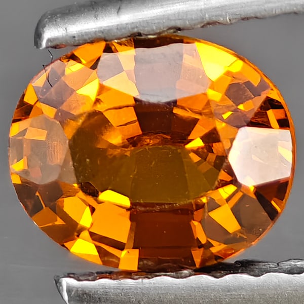 Natural Orange Spessartine Garnet Gemstones 0.81 Ct. Oval Shape 6.6 x 5.5 Mm.: Product ID: 802937834 Product Name: Natural Spessartine Weight: 0.81 CT. Size: 6.6 x 5.5 x 3.3 MM. Shape: Oval Shape Color: Orange Clarity:VSI Luster: Good Gems Origin: Namibia Treatment: Unheated Cry