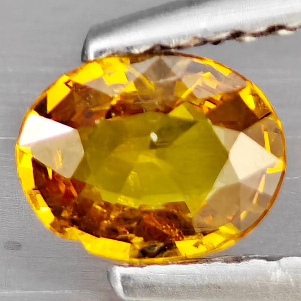 Natural Yellow Sapphire Gemstones 0.50 Ct. Oval Shape 5.9 x 4.6 Mm.: Product ID: 806163037 Product Name: Natural Yellow Sapphire Weight: 0.50 CT. Size: 5.9 x 4.6 x 2.3 MM. Shape: Oval Color: Yellow Clarity:SI1 Luster: Good Gems Origin: Thailand Treatment: Heated Crysta
