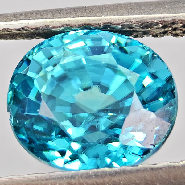 Natural Blue Zircon Gemstones 2.62 Ct. Oval Shape 7.3 x 6.4 Mm.: Product ID: 807743030 Product Name: Natural Zircon Weight: 2.62 CT. Size: 7.3 x 6.4 x 5.4 MM. Shape: Oval Shape Color: Blue Clarity:VSI - SI1 Luster: Good Gems Origin: Cambodia Treatment: Heated Cryst