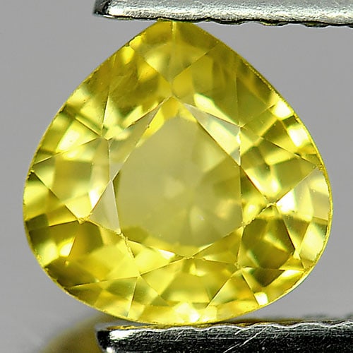 Natural Yellow Chrysoberyl Gemstones 1.02 Ct. Pear Shape 6.1 x 3.5 Mm.: Product ID: 801701074 Product Name: Natural Chrysoberyl Weight: 1.02 CT. Size: 6.1 x 6.1 x 3.5 MM. Shape: Pear Color: Yellow Clarity:VVS Luster: Very Good Gems Origin: Madagascar Treatment: Unheated C