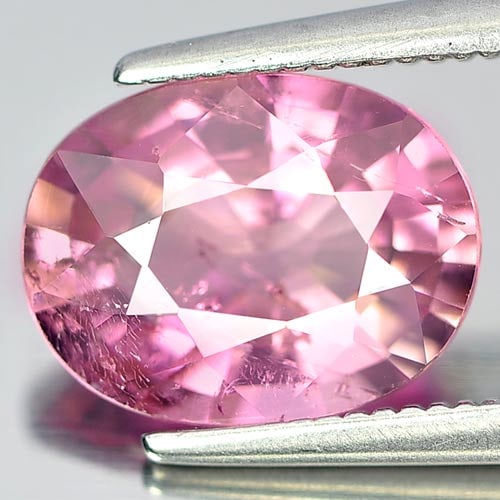 Natural Pink Tourmaline Gemstones 2.40 Ct. Oval Shape 10 x 7.5 Mm.: Product ID: 107206315 Product Name: Natural Tourmaline Weight: 2.40 CT. Size: 10 x 7.5 x 4.8 MM. Shape: Oval Color: Pink Clarity:SI Luster: Good Gems Origin: Nigeria Treatment: Unheated Crystal Struct