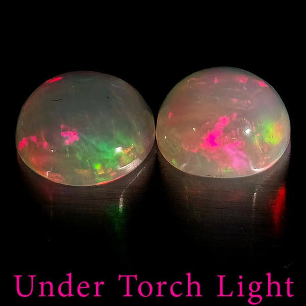 Natural Multi Color Opal Gemstones 1.63 Ct. 2 Pcs. Round Shape Cabochon 7 Mm.: Product ID: 818728276 Product Name: Natural Opal Weight: 1.63 CT. Size: 7 x 7 x 3.9 MM. Shape: Round Color: Multi-Color Clarity:Semi - Transparent Luster: Good Gems Origin: Ethiopia Treatment: Unheate
