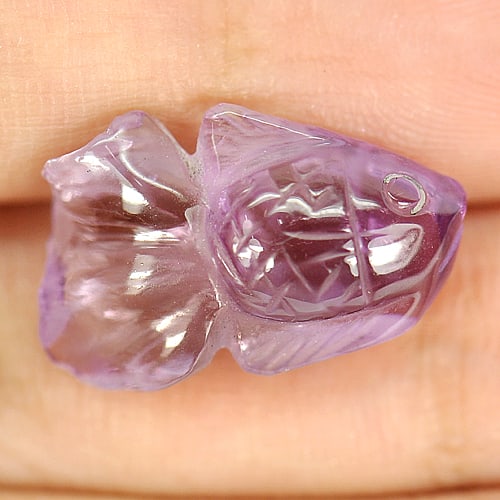 Natural Purple Amethyst Gemstones 7.96 Ct. Fish Carving 17.3 x 11.4 Mm.: Product ID: 810301673 Product Name: Natural Amethyst Weight: 7.96 CT. Size: 17.3 x 11.4 x 7 MM. Shape: Fish Carving Color: Purple Clarity:Semi - Transparent Luster: Good Gems Origin: Brazil Treatment: