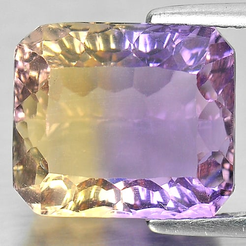 Natural Bi Color Ametrine Gemstones 7.90 Ct. Octagon Millennium Cut 12.3 x 10.8 Mm.: Product ID: 800408021 Product Name: Natural Ametrine Weight: 7.90 CT. Size: 12.3 x 10.8 x 7.6 MM. Shape: Octagon Millennium Cut Color: Bi Color Clarity:IF Luster: Very Good Gems Origin: Bolivia Treatm