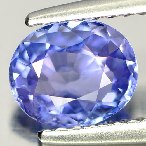 Natural Blue Tanzanite Gemstones 0.97 Ct. Oval Shape 6.9 x 5.8 Mm.: Product ID: 807005535 Product Name: Natural Tanzanite Weight: 0.97 CT. Size: 6.9 x 5.8 x 3.2 MM. Shape: Oval Color: Purple Clarity:SI Luster: Good Gems Origin: Tanzania Treatment: Heated Crystal Struc