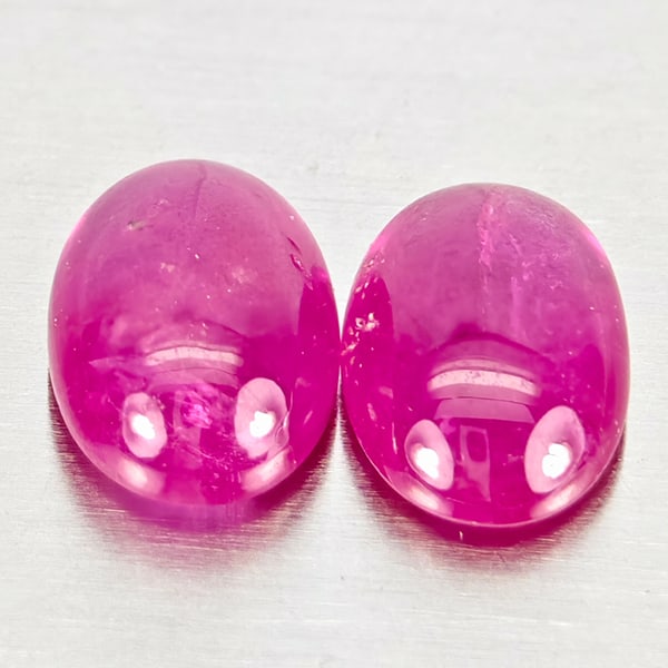 Natural Pink Red Jonson Ruby 1.28 Ct. 2 Pcs. Oval Cabochon Shape 6.1 x 4.2 Mm.: Product ID: 805935731 Product Name: Natural Ruby Weight: 1.28 CT. Size: 6.1 x 4.2 x 2.2 MM. Shape: Oval Cabochon Color: Pink Red Clarity:Semi - Transparent Luster: Good Gems Origin: Mozambique Treatme