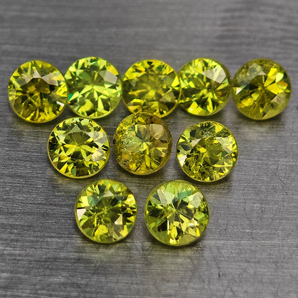 Natural Green Demantiod Garnet Gemstones 1.65 Ct. 10 Pcs. Round Diamond Cut 3.3 Mm.: Product ID: 802937662 Product Name: Natural Demantoid Weight: 1.65 CT. Size: 3.3 x 3.3 x 2.3 MM. Shape: Round Diamond Cut Color: Green Clarity:SI1 Luster: Good Gems Origin: Madagascar Treatment: Unhea