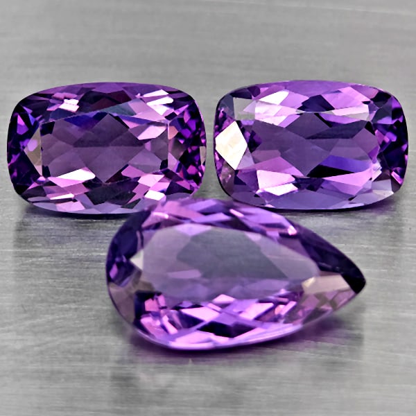 Natural Purple Amethyst Gemstones 9.66 Ct. 3 Pcs. Mixed Shape: Product ID: 800325623 Product Name: Natural Amethyst Weight: 9.66 CT. Size: 14.4 x 8.5 x 5.2 to 11.1 x 7.5 x 5.4 MM. Shape: Mixed Shape Color: Purple Clarity:VSI Luster: Good Gems Origin: Brazil Treat