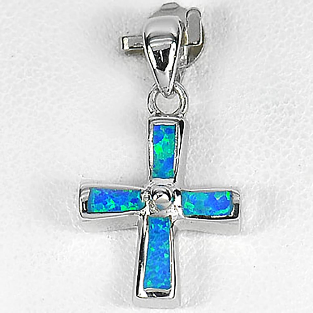 Multi Color Blue Created Opal Cross 925 Sterling Silver Pendant Jewelry 3.03 G.: Product ID: 280130020 Product Type: 925 Sterling Silver Fine Jewelry Jewelry Weight: 3.03 Grams. Gemstones Color: Multi-Color Metal: Solid Silver 92.5%. Gemstone Detail: Multi Color Blue Created Opal 