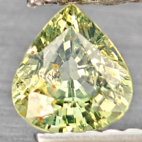 Natural Green Sapphire Gemstones 0.58 Ct. Pear Shape 5.4 x 4.7 Mm.: Product ID: 806162767 Product Name: Natural Green Sapphire Weight: 0.58 CT. Size: 5.4 x 4.3 x 3 MM. Shape: Pear Shape Color: Green Clarity:SI1 Luster: Good Gems Origin: Thailand Treatment: Heated Crys