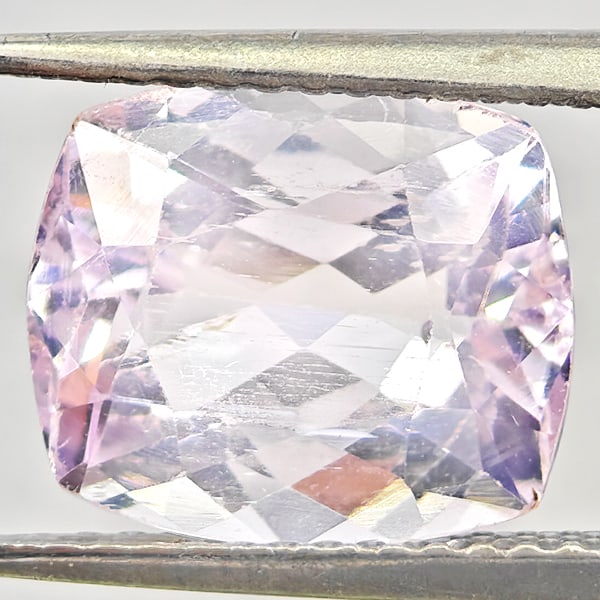 Natural Light Pink Kunzite Gemstones 3.99 Ct. Cushion Shape 10.7 x 9.1 Mm.: Product ID: 804103452 Product Name: Natural Kunzite Weight: 3.99 CT. Size: 10.7 x 9.1 x 5.6 MM. Shape: Cushion Shape Color: Light Pink Clarity:VSI - SI1 Luster: Good Gems Origin: Afghanistan Treatment