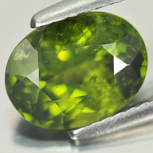 Natural Green Peridot Gemstones 2.31 Ct. Oval Shape 9.3 x 7.1 Mm.: Product ID: 805305458 Product Name: Natural Peridot Weight: 2.31 CT. Size: 9.3 x 7.1 x 5 MM. Shape: Oval Color: Green Clarity:SI Luster: Good Gems Origin: Thailand Treatment: Unheated Crystal Structur