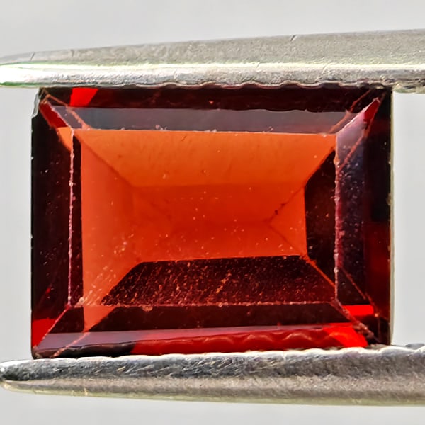 Natural Orangish Red Garnet Gemstones 1.48 Ct. Baguette Shape 7.8 x 5.9 Mm.: Product ID: 802937024 Product Name: Natural Red Garnet Weight: 1.48 CT. Size: 7.8 x 5.9 x 3 MM. Shape: Baguette Color: Orangish Red Clarity:VVS - VSI Luster: Good Gems Origin: Tanzania Treatment: Unhe