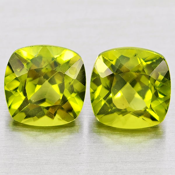 Natural Green Peridot Gemstones 2.50 Ct. 2 Pcs. Cushion Shape 6.1 Mm.: Product ID: 805317392 Product Name: Natural Peridot Weight: 2.50 CT. Size: 6.1 x 6.1 x 4.6 MM. Shape: Cushion Shape Color: Green Clarity:VSI - SI1 Luster: Good Gems Origin: Pakistan Treatment: Unheate