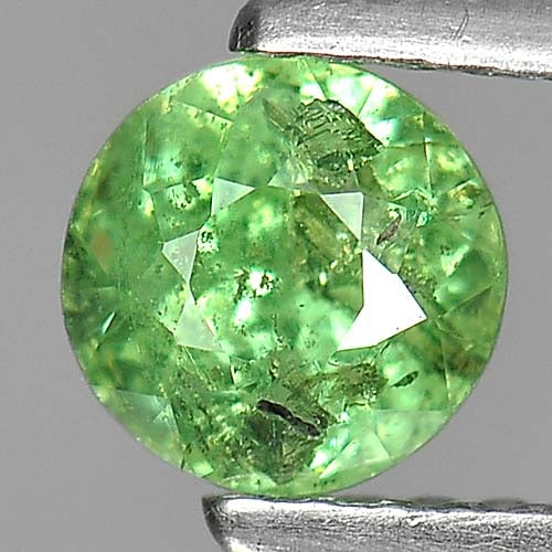 Natural Green Demantoid Garnet Gemstones 0.91 Ct. Round Shape 5.4 Mm.: Product ID: 802919292 Product Name: Natural Demantoid Weight: 0.91 CT. Size: 5.4 x 5.4 x 4.3 MM. Shape: Round Color: Green Clarity:SI Luster: Good Gems Origin: Madagascar , Africa Treatment: Unheated 