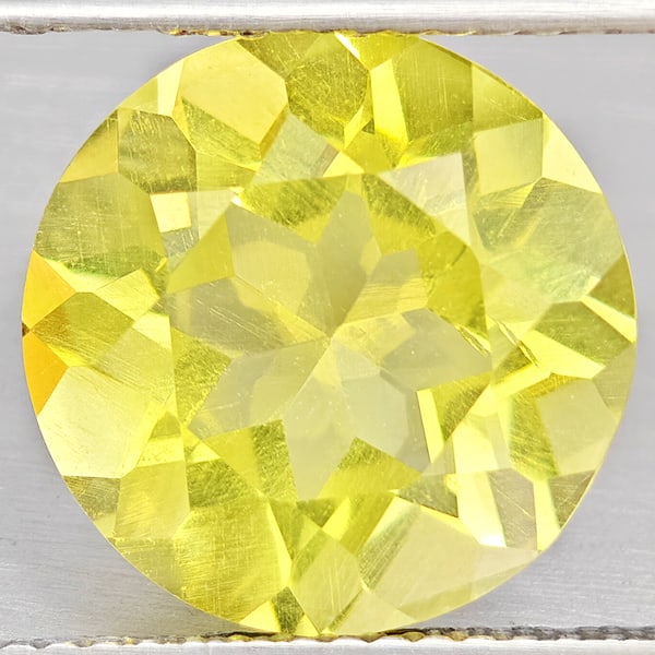 Natural Yellow Lemon Quartz Gemstones 5.31 Ct. Round Shape 11.9 Mm.: Product ID: 805530187 Product Name: Natural Quartz Weight: 5.31 CT. Size: 11.9 x 11.9 x 7.4 MM. Shape: Round Shape Color: Yellow Lemon Clarity:VSI Luster: Good Gems Origin: Brazil Treatment: Unheated 