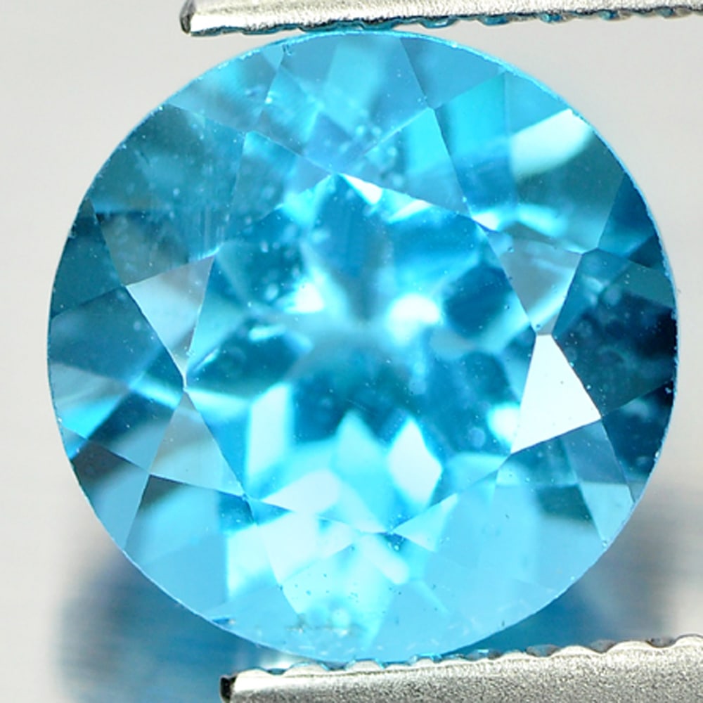 Natural Swiss Blue Topaz Gemstones 3.60 Ct. Round Shape 9.1 Mm.: Product ID: 807156101 Product Name: Natural Blue Topaz Weight: 3.60 CT. Size: 9.1 x 9.1 x 6.2 MM. Shape: Round Color: Swiss Blue Clarity:VSI Luster: Good Gems Origin: Brazil Treatment: Treated Crystal