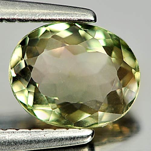 Natural Brownish Green Tourmaline Gemstones 0.72 Ct. Oval Shape 6.4 x 5.1 Mm.: Product ID: 807246423 Product Name: Natural Tourmaline Weight: 0.72 CT. Size: 6.4 x 5.1 x 3 MM. Shape: Oval Color: Brownish Green Clarity:VSI Luster: Good Gems Origin: Nigeria Treatment: Unheated Crys