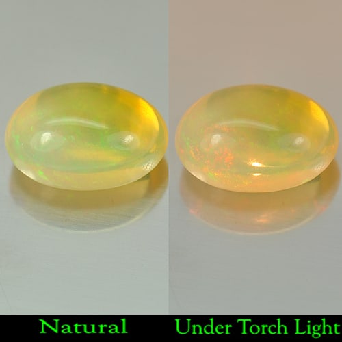 Natural Multi Color Opal Gemstones 3.74 Ct. Oval Cabochon Shape 12.4 x 8.8 Mm.: Product ID: 818707325 Product Name: Natural Opal Weight: 3.74 CT. Size: 12.4 x 8.8 x 6.9 MM. Shape: Oval Cabochon Color: Multi Color Clarity:Semi - Transparent Luster: Good Gems Origin: Ethiopia Treat
