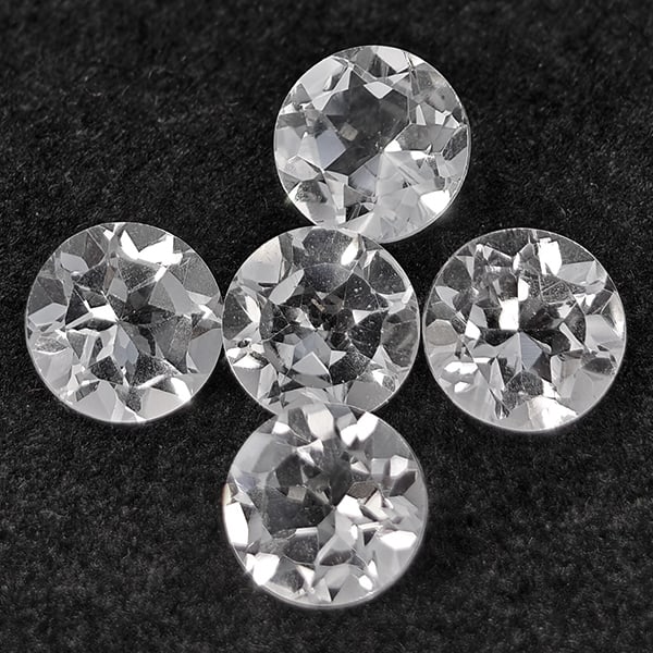 Natural White Topaz Gemstones 5.33 Ct. 5 Pcs. Round Shape 6.3 Mm.: Product ID: 807168798 Product Name: Natural Topaz Weight: 5.33 CT. Size: 6.3 x 6.3 x 4.3 MM. Shape: Round Color: White Clarity:VSI Luster: Good Gems Origin: Brazil Treatment: Unheated Crystal Structur