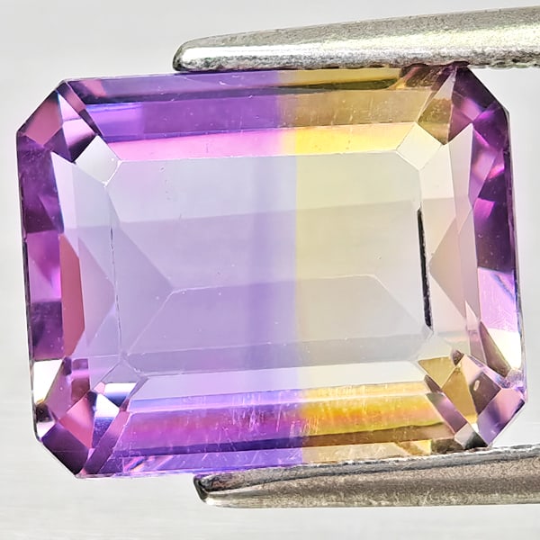Natural Bi Color Ametrine Gemstones 3.11 Ct. Octagon Shape 10 x 8.1 Mm.: Product ID: 800408385 Product Name: Natural Ametrine Weight: 3.11 CT. Size: 10 x 8.1 x 4.9 MM. Shape: Octagon Color: Bi Color Clarity:VSI Luster: Good Gems Origin: Bolivia Treatment: Unheated Crystal 
