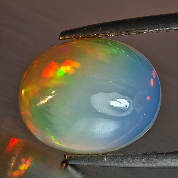 Natural Multi-Color Play Of Colour Opal Gemstone 3.43 Ct. Oval Cabochon Shape 12.1 x 9.8 Mm (1 of 3)