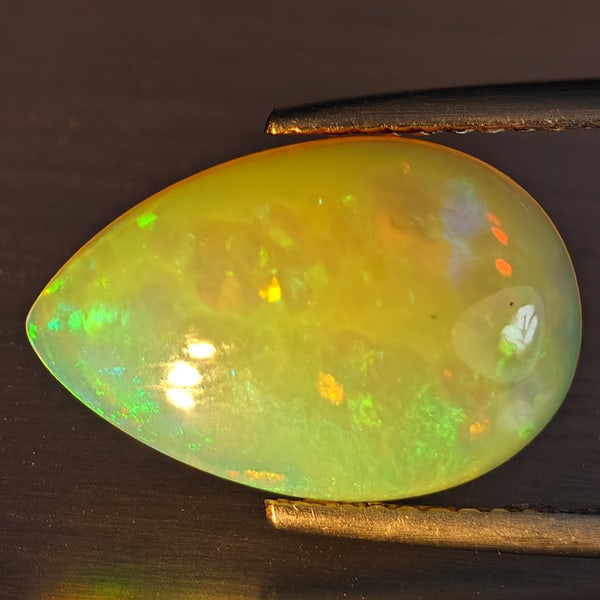 Natural Multi-Color Play Of Colour Opal Gemstone 3.01 Ct. Pear Cabochon Shape 15.4 x 10.1 Mm. (1 of 3)