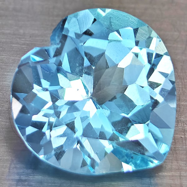 Natural Baby Blue Topaz Gemstones 5.36 Ct. Heart Shape 11.2 Mm.: Product ID: 807168774 Product Name: Natural Blue Topaz Weight: 5.36 CT. Size: 11.2 x 11.2 x 6.9 MM. Shape: Heart Shape Color: Baby Blue Clarity:VSI Luster: Good Gems Origin: Brazil Treatment: Treated 