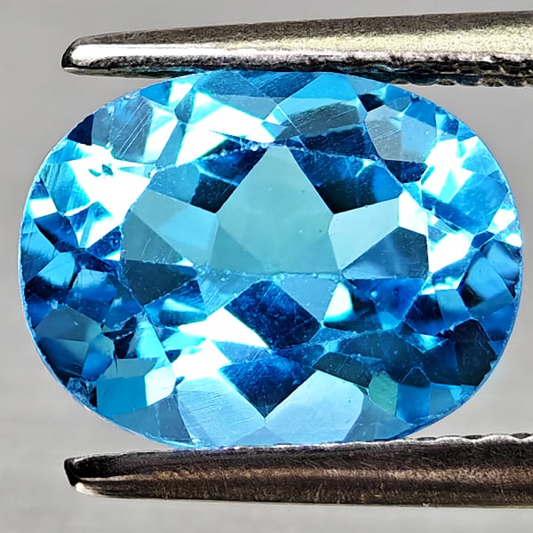 Natural Swiss Blue Topaz Gemstones 2.41 Ct. Oval Shape 9.2 x 7.2 Mm.: Product ID: 807168160 Product Name: Natural Blue Topaz Weight: 2.41 CT. Size: 9.2 x 7.2 x 4.7 MM. Shape: Oval Shape Color: Swiss Blue Clarity:VVS - VSI Luster: Good Gems Origin: Brazil Treatment: Trea