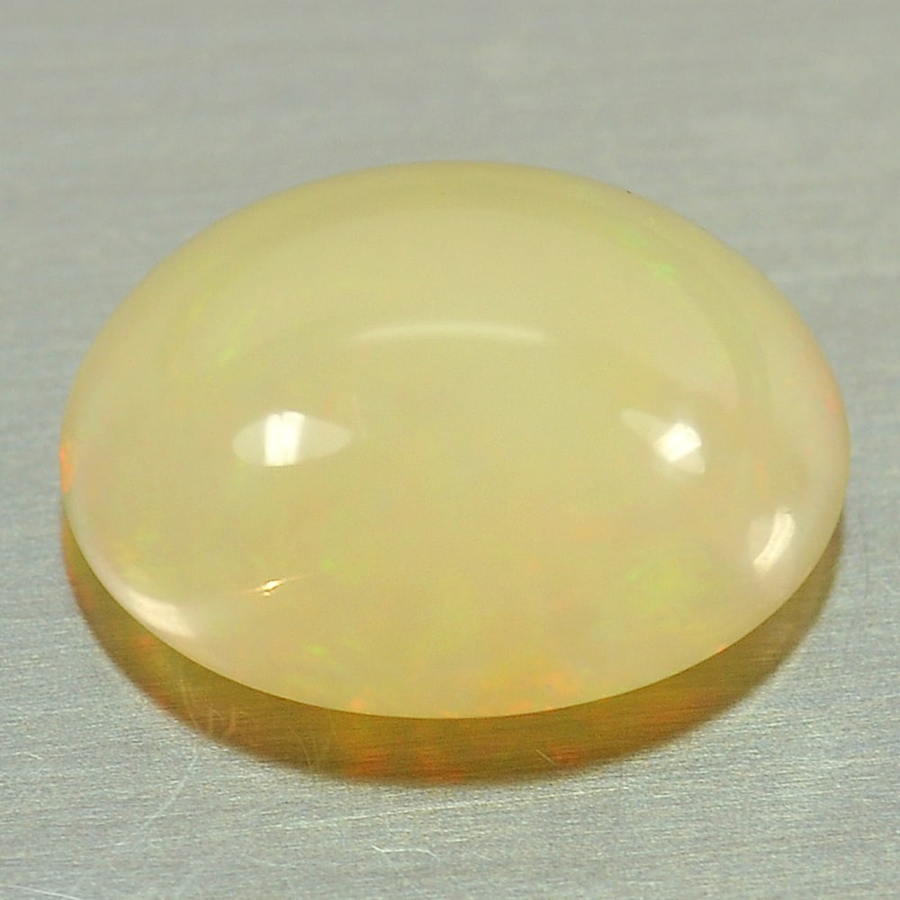 Natural Multi Color Opal Gemstones 3.54 Ct. Oval Cabochon Shape 12.7 x 9.3 Mm. (1 of 3)