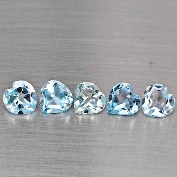 Natural Baby Blue Topaz Gemstones 4.51 Ct. 5 Pcs. Heart Shape 6.3 Mm.: Product ID: 807168981 Product Name: Natural Blue Topaz Weight: 4.51 CT. Size: 6.3 x 6.3 x 4.1 MM. Shape: Heart Shape Color: Baby Blue Clarity:SI1 Luster: Good Gems Origin: Brazil Treatment: Treated Cr