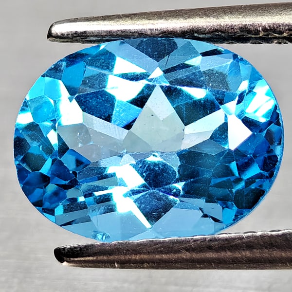 Natural Swiss Blue Topaz Gemstones 2.38 Ct. Oval Shape 9.1 x 7.2 Mm.: Product ID: 807168166 Product Name: Natural Blue Topaz Weight: 2.39 CT. Size: 9.1 x 7.2 x 4.8 MM. Shape: Oval Shape Color: Swiss Blue Clarity:VVS - VSI Luster: Good Gems Origin: Brazil Treatment: Trea