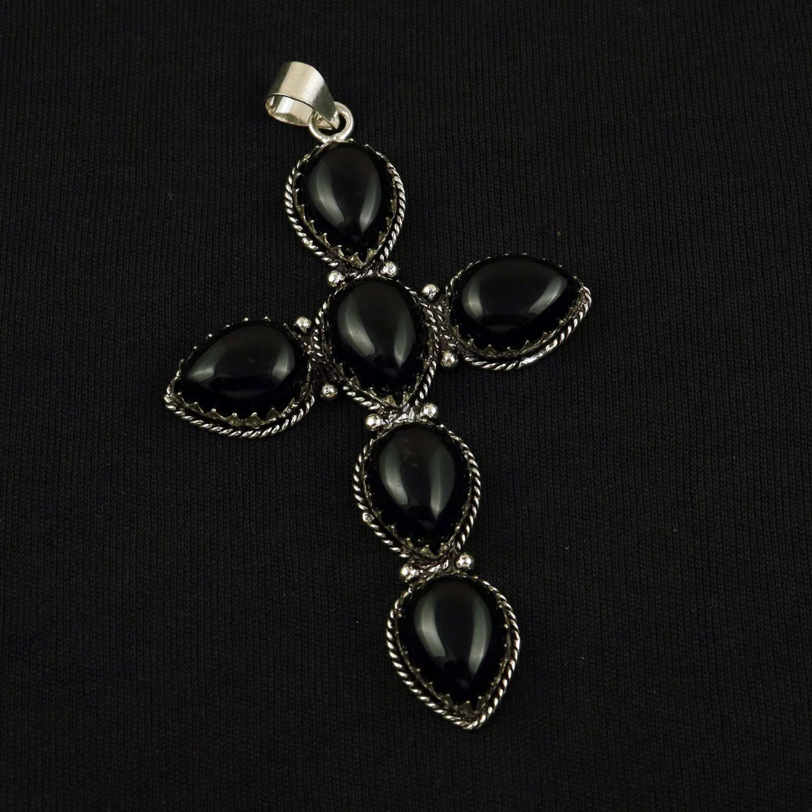 Natural Balck Onyx Silver Plated Handmade Cross Pendant: Product ID: 260512164805 Product - Handmade Silver Plated Pendant Metal - 92.5 Sterling Silver Plated Pendant Size - 3x2 Inch Gemstone - Balck Onyx Gemstone Origin - India Gemstone Size - 12X16 MM ( 6