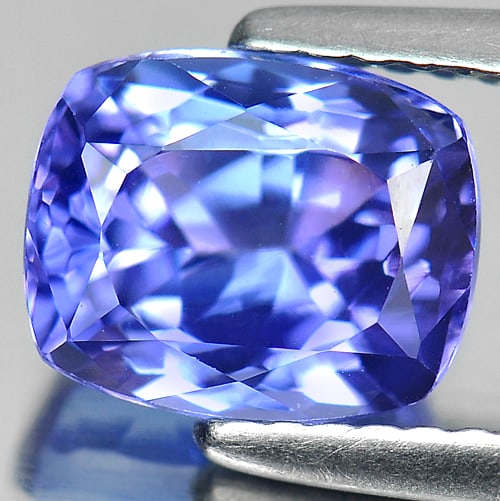Natural Violetish Blue Tanzanite Gemstones 2.48 Ct. Clean Cushion Shape 6.63 x 8.17 Mm.: Product ID: 107000425 Product Name: Natural Tanzanite Weight: 2.48 CT. Size: 6.63 x 8.17 x 5.30 MM. Shape: Cushion Color: Blue Clarity:IF Luster: Very Good Gems Origin: Tanzania Treatment: Heated Crys