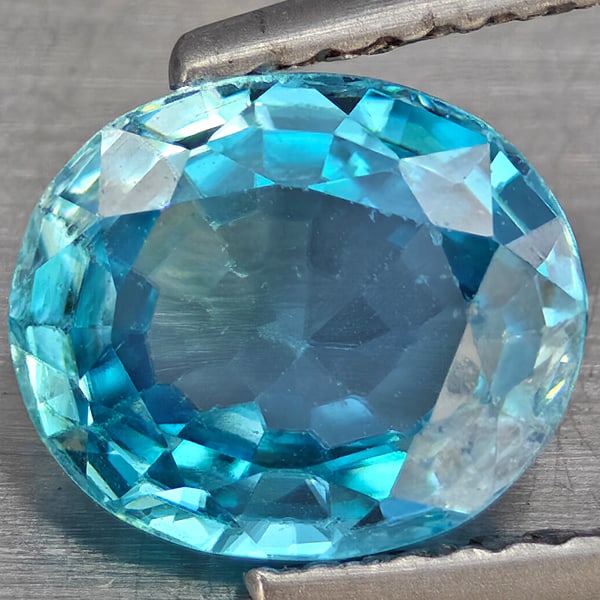 Natural Blue Zircon Gemstones 2.27 Ct. Oval Shape 8.3 x 7.2 Mm.: Product ID: 807743087 Product Name: Natural Zircon Weight: 2.27 CT. Size: 8.3 x 7.2 x 3.6 MM. Shape: Oval Shape Color: Blue Clarity:VSI Luster: Good Gems Origin: Cambodia Treatment: Heated Crystal Str