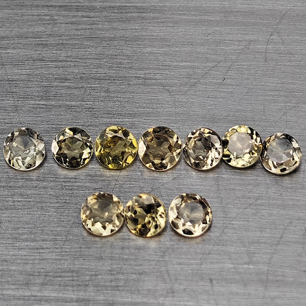 Natural Color Change Garnet Gemstones 1.08 Ct. 10 Pcs. Round Shape 2.9 Mm.: Product ID: 802937863 Product Name: Natural Color Change Garnet Weight: 1.08 CT. Size: 2.9 x 2.9 x 1.7 MM. Shape: Round Shape Color: Champagne Clarity:SI1 Luster: Good Gems Origin: Nigeria Treatment: 