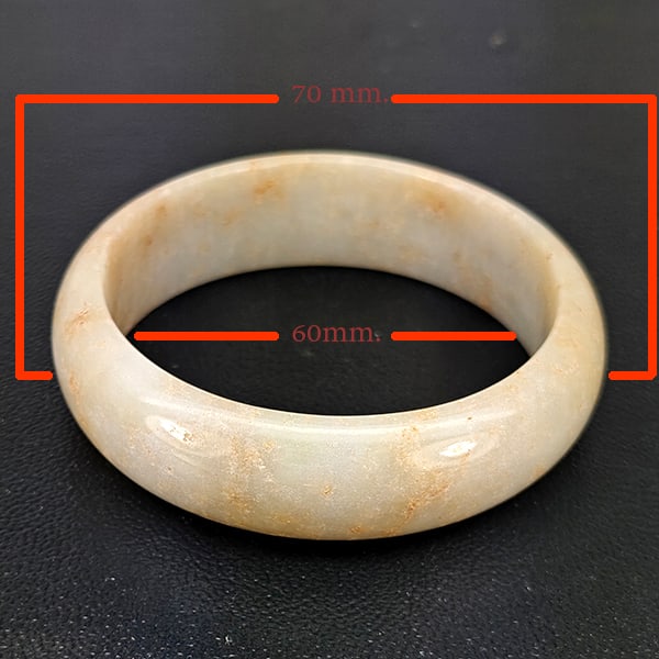 Natural Honey Jade Bangle 362.00 Ct. Diameter 60 Mm.: Product ID: 819816314 Product Name: Natural Jade Weight: 362.00 CT. Size: 70 x 60 MM. Shape: Round Shape Color: Honey Clarity:Opaque Luster: None Gems Origin: Thailand Treatment: Unheated Crystal Stru