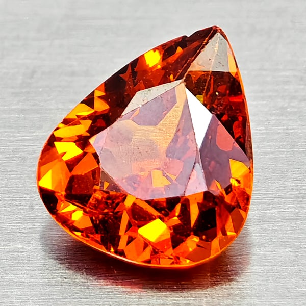 Natural Orangish Red Spessartine Garnet Gemstones 0.92 Ct. Pear Shape 6.7 x 5.6 Mm.: Product ID: 802936812 Product Name: Natural Spessartine Weight: 0.92 CT. Size: 6.7 x 5.6 x 3.3 MM. Shape: Pear Shape Color: Orangish Red Clarity:VSI Luster: Good Gems Origin: Namibia,Africa Treatment: