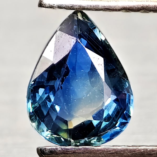 Natural Blue Green Sapphire Gemstones 0.67 Ct. Pear Shape 6.4 x 5 Mm.: Product ID: 806012110 Product Name: Natural Blue Sapphire Weight: 0.67 CT. Size: 6.4 x 5 x 2.6 MM. Shape: Pear Shape Color: Blue Green Clarity:VSI Luster: Good Gems Origin: Thailand Treatment: Heated 
