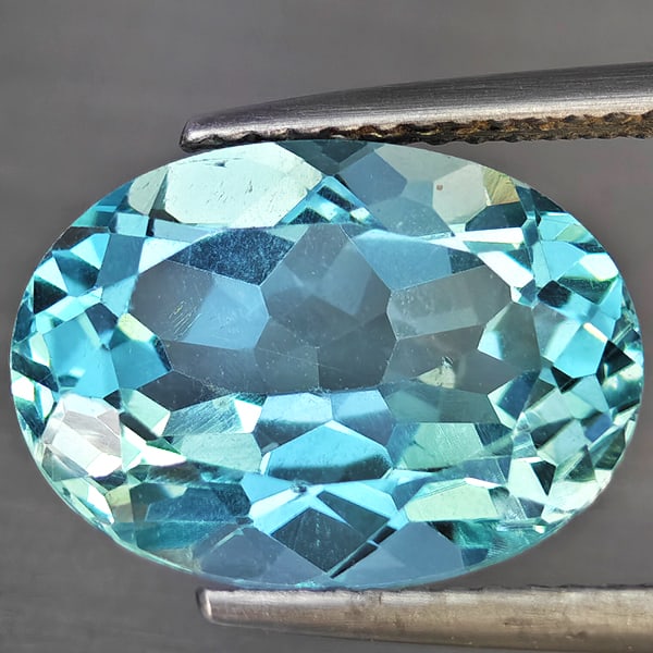 Natural Baby Blue Topaz Gemstones 7.81 Ct. Oval Shape 14 x 10.2 Mm. (1 of 3)