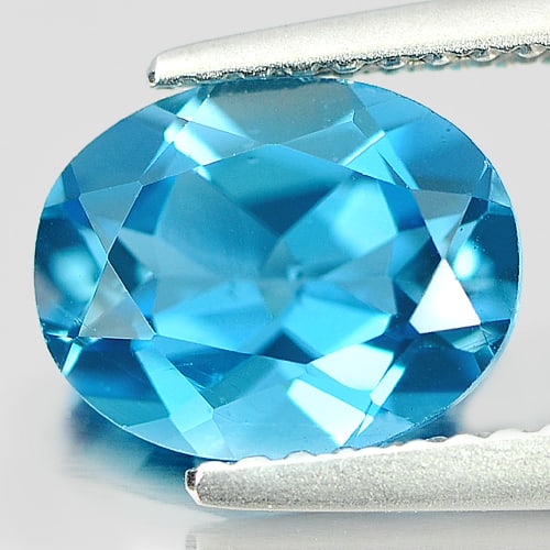 Natural London Blue Topaz Gemstones 2.17 Ct. Oval Shape 9.1 x 7.1 Mm.: Product ID: 807161021 Product Name: Natural Blue Topaz Weight: 2.17 CT. Size: 9.1 x 7.1 x 4.5 MM. Shape: Oval Color: London Blue Clarity:VSI Luster: Good Gems Origin: Brazil Treatment: Treated Crystal