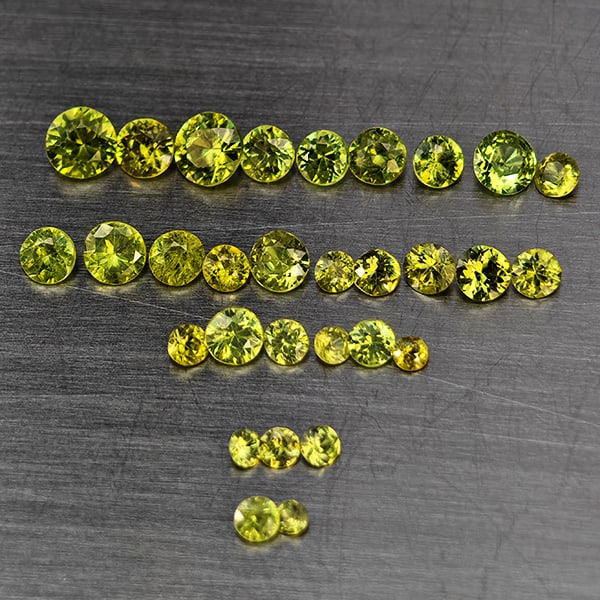 Natural Green Demantiod Garnet Gemstones 1.48 Ct. 30 Pcs. Round Diamond Cut 3.2 Mm.: Product ID: 802937442 Product Name: Natural Demantoid Weight: 1.48 CT. Size: 3.2 x 3.2 x 2.3 to 1 x 1 x 1.2 MM. Shape: Round Diamond Cut Color: Green Clarity:SI1 Luster: Good Gems Origin: Madagascar T