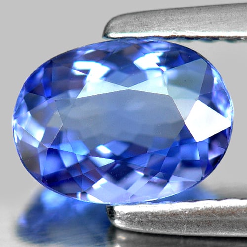 Natural Violetish Blue Tanzanite Gemstones 1.02 Ct. Clean Oval Shape 7.50 x 5.57 Mm.: Product ID: 807005186 Product Name: Natural Tanzanite Weight: 1.02 CT. Size: 7.50 x 5.57 x 3.18 MM. Shape: Oval Color: Blue Clarity:IF Luster: Very Good Gems Origin: Tanzania Treatment: Heated Crystal