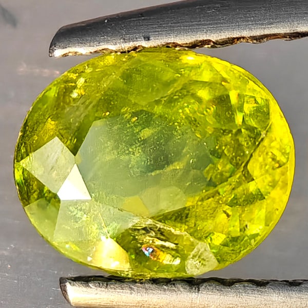 Natural Multi-Color Sphene Gemstones With Rainbow Spark 1.18 Ct. Oval Shape 7.3 x 6.1 Mm.: Product ID: 806509224 Product Name: Natural Sphene Weight: 1.18 CT. Size: 7.3 x 6.1 x 3.6 MM. Shape: Oval Shape Color: Multi-Color Clarity:SI1 Luster: Good Gems Origin: Madagascar Treatment: Unheated 
