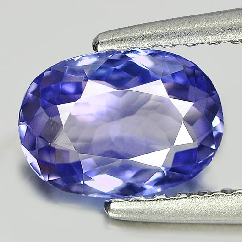 Natural Violetish Blue Tanzanite Gemstones 0.98 Ct. Oval Shape 7.7 x 5.56 Mm.: Product ID: 807004370 Product Name: Natural Tanzanite Weight: 0.98 CT. Size: 7.70 x 5.56 x 2.83 MM. Shape: Oval Color: Blue Clarity:IF Luster: Very Good Gems Origin: Tanzania Treatment: Heated Crystal