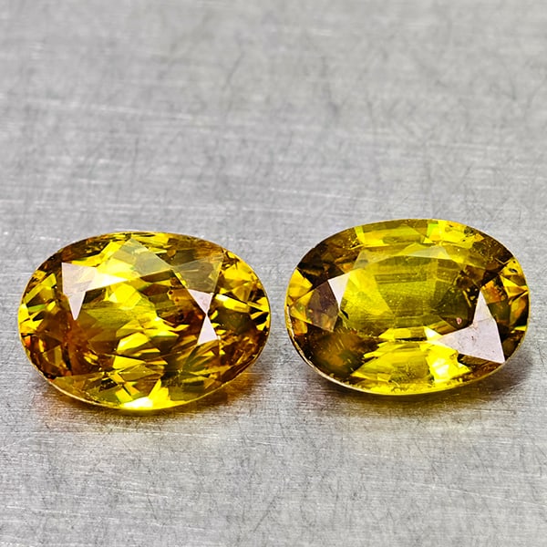 Natural Multi Color Sphene Gemstones With Rainbow Spark 1.62 Ct. 2 Pcs. Oval Shape 6.8 x 4.9 Mm.: Product ID: 806509048 Product Name: Natural Sphene Weight: 1.62 CT. Size: 6.8 x 4.9 x 2.8 MM. Shape: Oval Color: Yellow Green With Rainbow Spark Clarity:SI1 Luster: Good Gems Origin: Madagascar Treatm