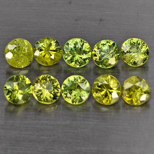 Natural Green Demantiod Garnet Gemstones 1.55 Ct. 10 Pcs. Round Diamond Cut 3.2 Mm.: Product ID: 802937709 Product Name: Natural Demantoid Weight: 1.55 CT. Size: 3.2 x 3.2 x 2.6 MM. Shape: Round Diamond Cut Color: Green Clarity:SI1 Luster: Good Gems Origin: Madagascar Treatment: Unhea