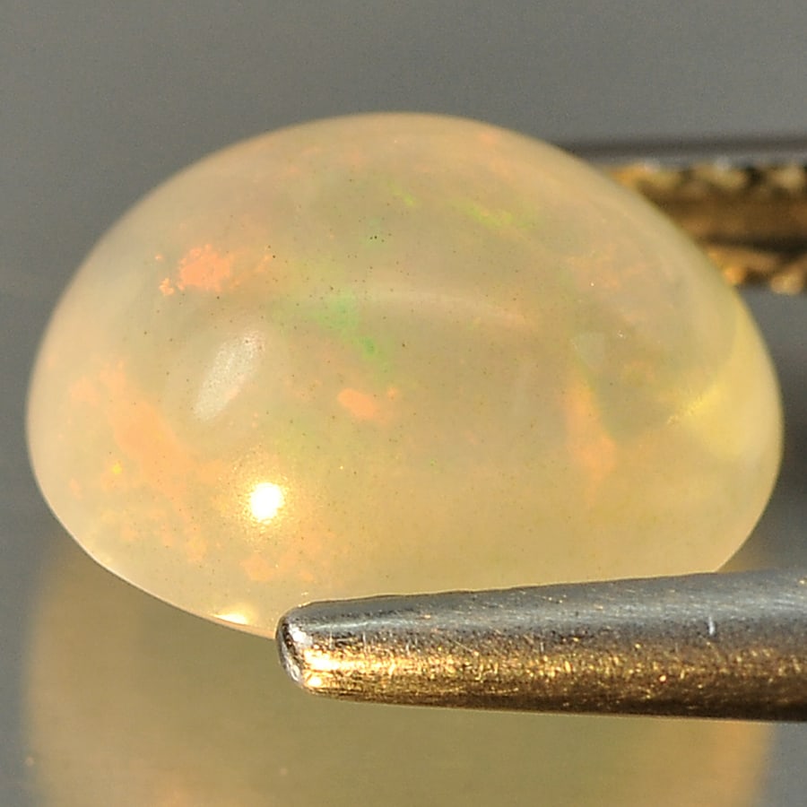 Natural Multi Color Opal Gemstones 2.16 Ct. Oval Cabochon Shape 9.3 x 8.1 Mm. (1 of 3)